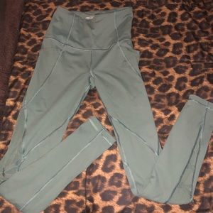 Green cute workout leggings with side phone holder